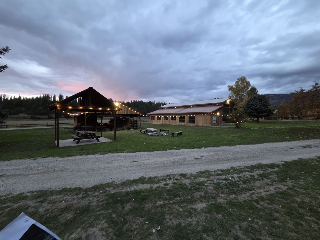 The pavilion lit up at dusk