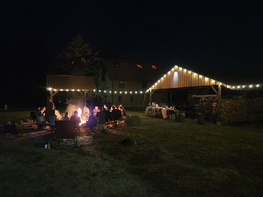 The fire and the string lights after dark